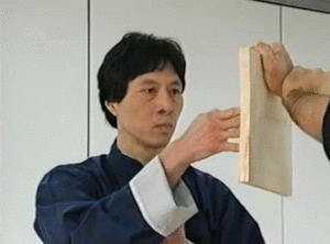 master kwok breaks board using ging