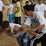 Arm bar by Master Kwok on the beach