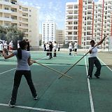 girls practice wing chun pole sparring