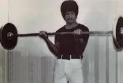 Bruce Lee with Barbell weights